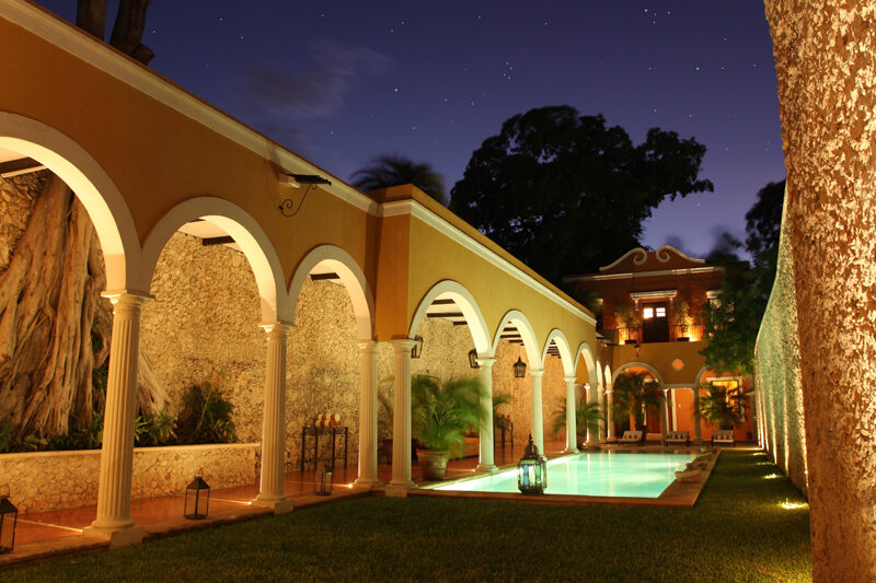 Pool and arches at night, Hotel Hacienda VIP